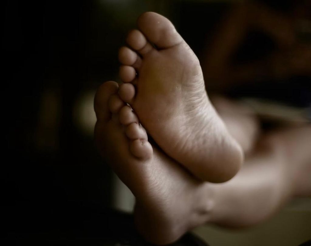 Relaxed bare feet after a pedicure